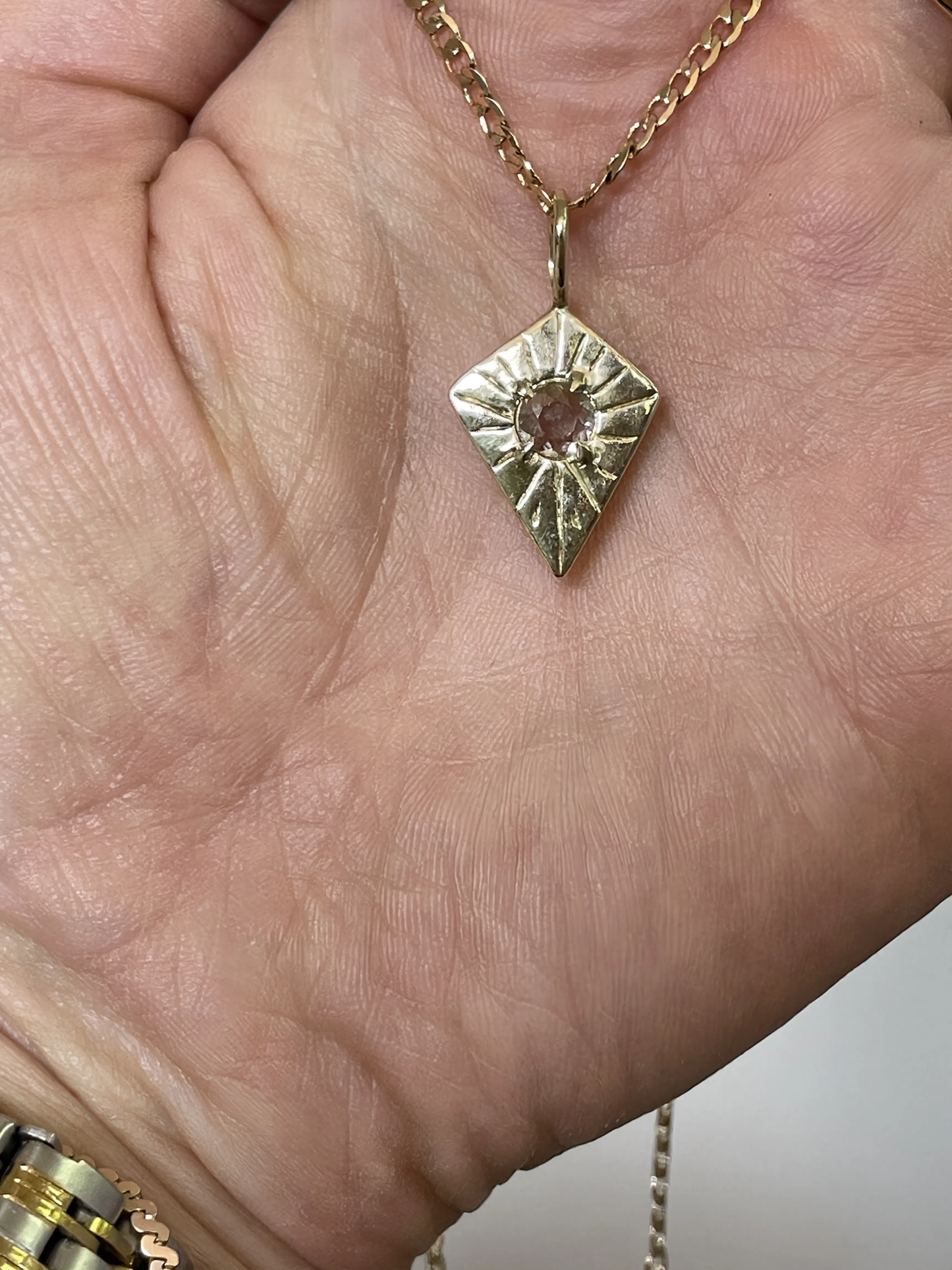 Sapphire amulet